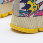 Scarpe sportive da donna con stampa colorata realizzata in ecopelle / Scarpe sportive da donna con stampa colorata realizzata in ecopelle /