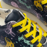 Scarpe sportive da donna con stampa colorata realizzata in ecopelle / Scarpe sportive da donna con stampa colorata realizzata in ecopelle /