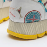 Scarpe sportive donna con stampa colorata realizzata in ecopelle / Scarpe sportive donna con stampa colorata realizzata in ecopelle /