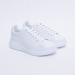 Sneakers bianche eleganti in pelle da donna /