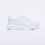 Sneakers bianche eleganti in pelle da donna /