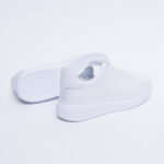 Sneakers bianche eleganti in pelle da donna /